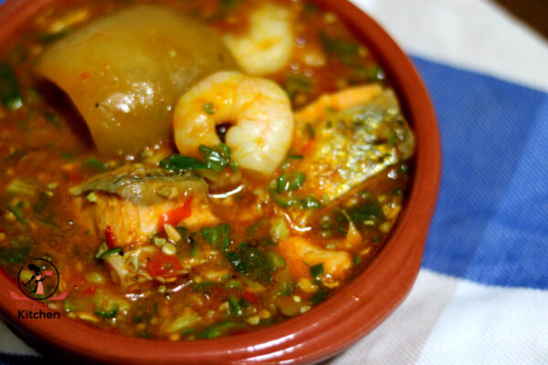 image of okra soup cooup with salmon, shrimps and ponmo